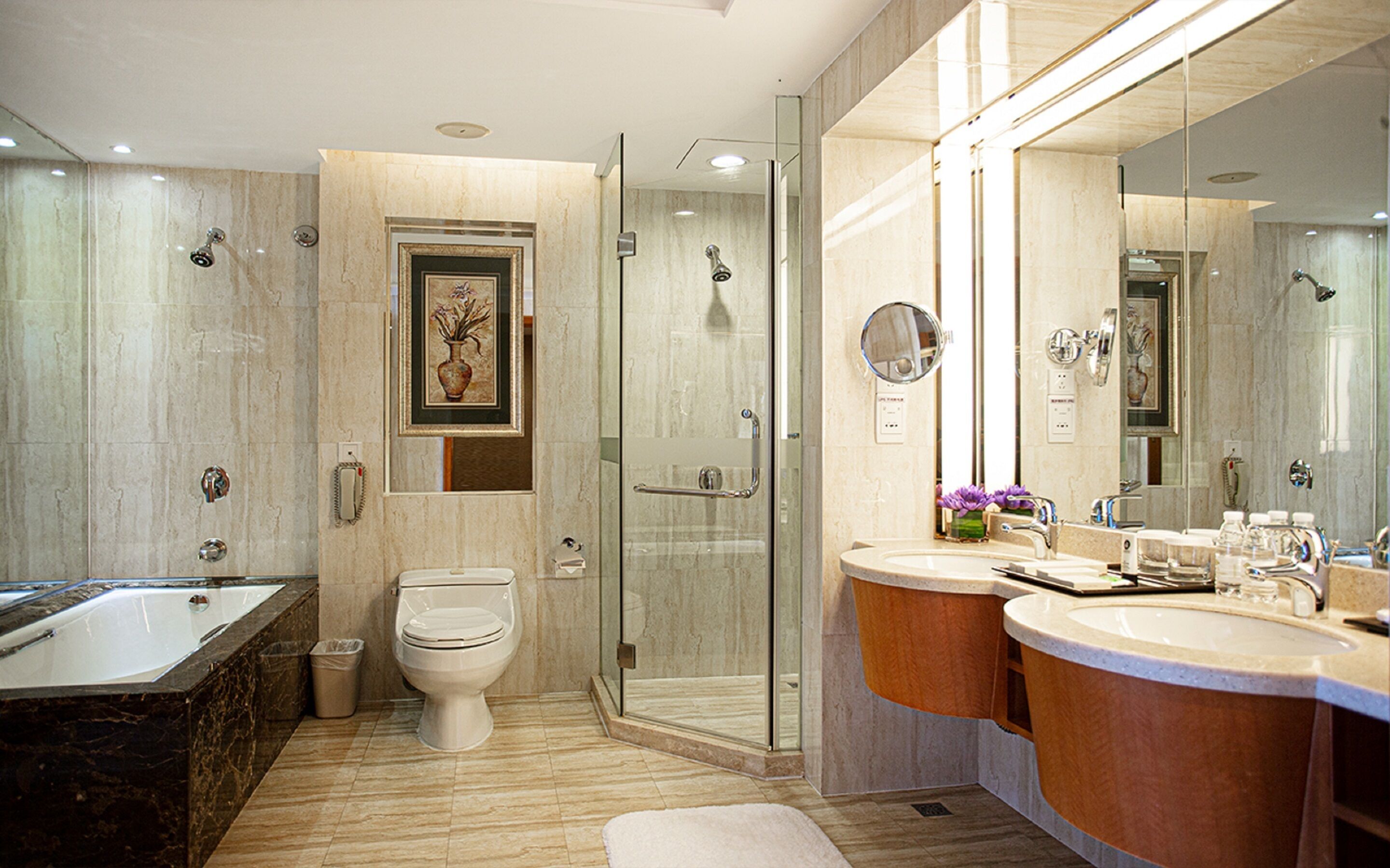 king bed suite | bathroom | separate bathtub and shower, free toiletries, hair dryer, dressing gowns