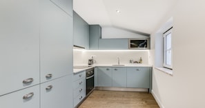 Appartement Supérieur | Cuisine privée | Réfrigérateur, micro-ondes, four, plaque de cuisson