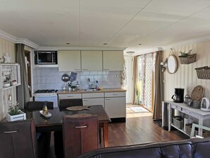 Fridge, stovetop, coffee/tea maker, electric kettle