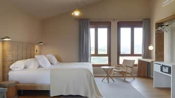 Junior studio suite | Donsdekens, een minibar, een kluis op de kamer, individueel gedecoreerd