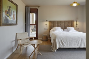 Superior Room | Down comforters, minibar, in-room safe, individually decorated