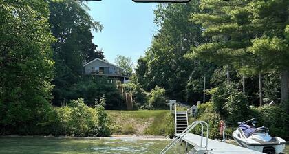 Torch Lake Waterfront House with 100' Private Shoreline and New Sandy Beach