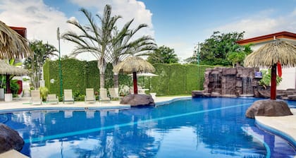 Amazing waterfront oasis with furnished terrace, multiple pools, & beach access