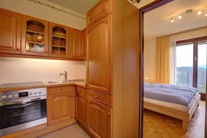 Apartamento | Cocina privada | Frigorífico, cafetera o tetera, hervidor eléctrico y tostadora