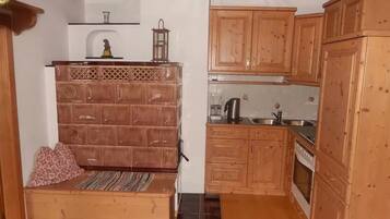Fridge, stovetop, electric kettle, highchair