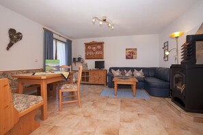 Apartment, 1 Bedroom (Alpenrose) | Living area | 32-inch flat-screen TV with satellite channels, TV, table tennis
