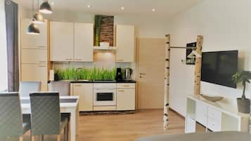 Apartment, 1 Bedroom | Private kitchen | Full-size fridge, oven, stovetop, dishwasher