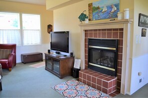 House, Multiple Beds (94 S Cottage #3) | Living area | Fireplace, foosball - 94 S Cottage #3 (Gearhart)