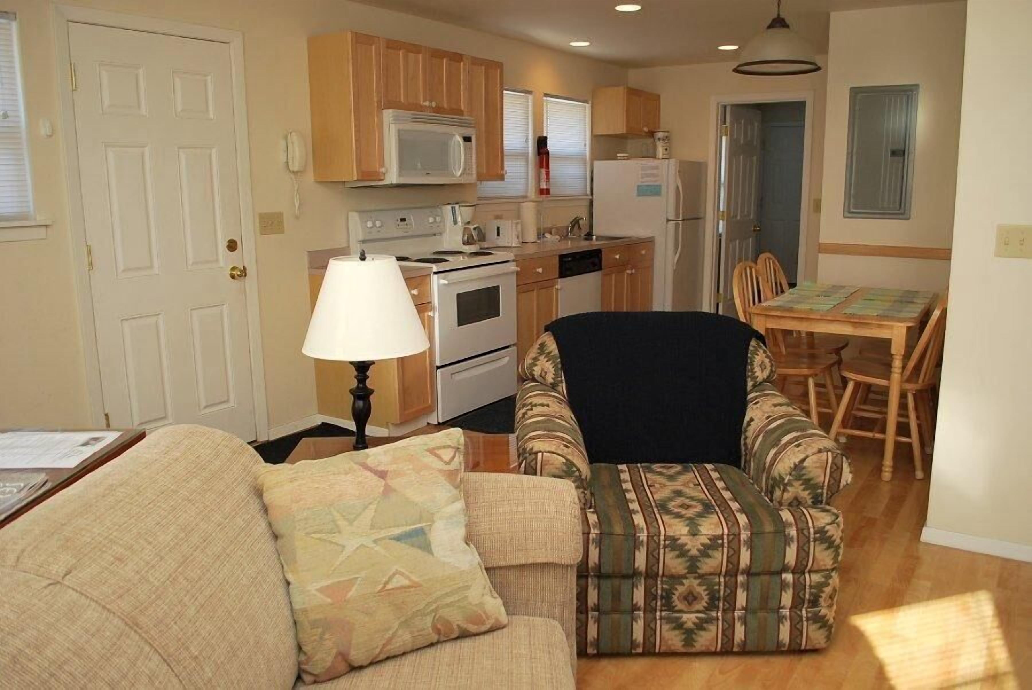 House, Multiple Beds (1860 Beach Dr. #2) | Living room | Fireplace