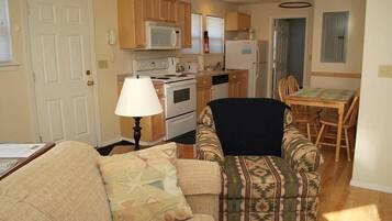 House, Multiple Beds (1860 Beach Dr. #2) | Living room | Fireplace