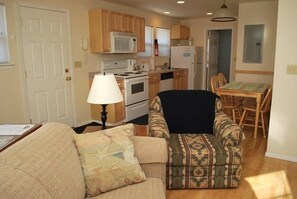 House, Multiple Beds (1860 Beach Dr. #2) | Living room | Fireplace