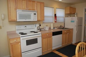 House, Multiple Beds (1860 Beach Dr. #2) | Private kitchen | Spices, paper towels