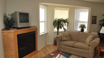 House, Multiple Beds (1860 Beach Dr. #2) | Living room | Fireplace