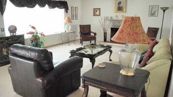 House, Multiple Beds (2360 S Downing) | Living room | Fireplace, table football