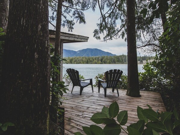 Relax in a serene lakeside setting with a sheltered seating area and tranquil views.