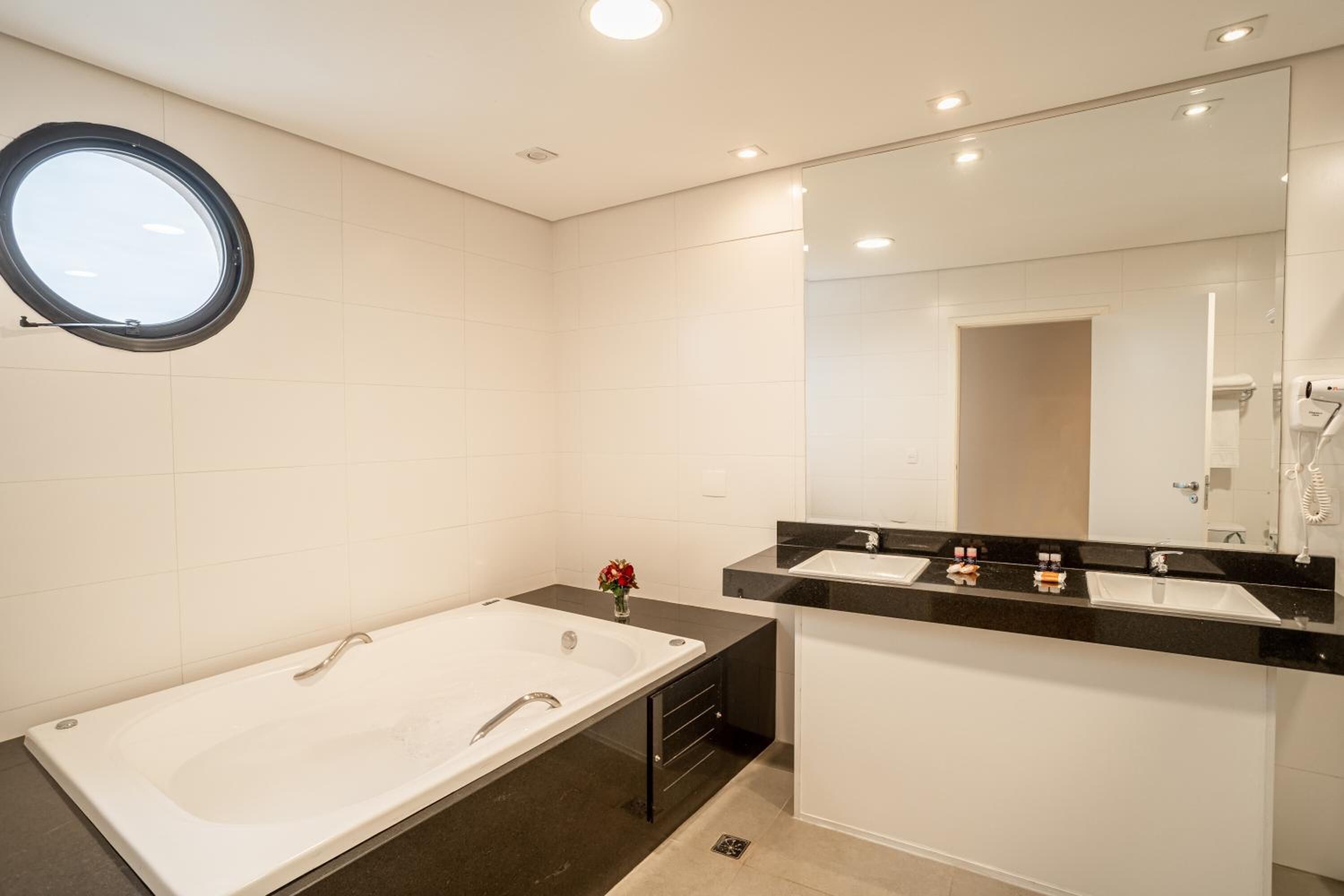 hair dryer, towels, soap, shampoo