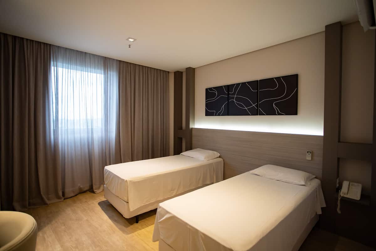 Twin Room | Minibar, desk, laptop workspace, free WiFi