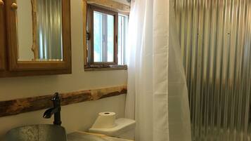 Combined shower/tub, hair dryer, towels, soap