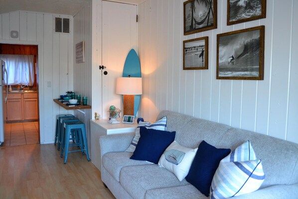 House, Multiple Beds (131 4th Ave Unit B) | Living room | Fireplace