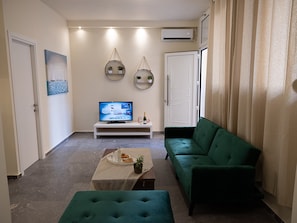 Luxury Apartment, 1 Bedroom, Non Smoking, Ground Floor | Living area | Flat-screen TV