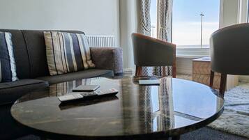 Apartment, 1 Bedroom, Sea View (1st Floor) | Living area | 50-inch Smart TV with digital channels