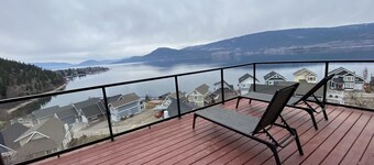Unobstructed panoramic water & mountain lake front cottage