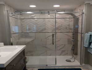 Shower, hair dryer, towels, soap