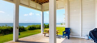 Dog-friendly bayfront home with elevator, pools, hot tubs & game room