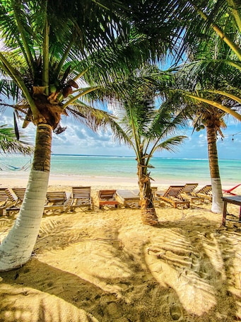 Beach nearby, white sand, beach towels, beach massages