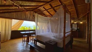 Suite superior, vista al mar | Vista a la playa o el mar