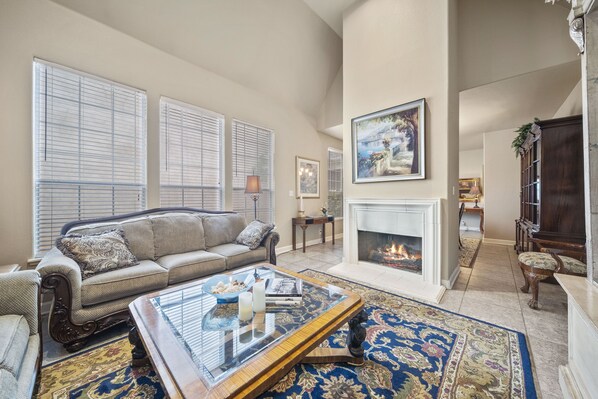 Smart TV, fireplace, books, offices