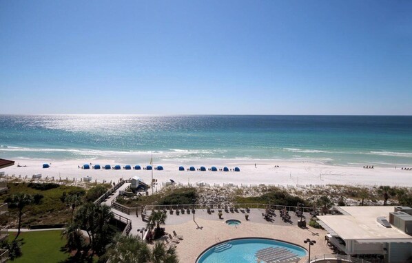 On the beach, sun-loungers
