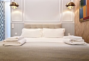 1 habitación, tabla de planchar con plancha, wifi gratis y ropa de cama 