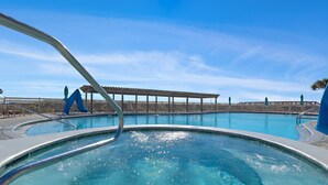 A heated pool - Sunset Jetty View! Enjoy one free beach chair set up and umbrella each day! (Destin)