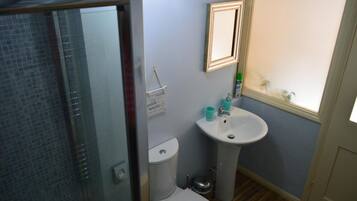 Family or Twin Room, Ensuite | Bathroom | Shower, hair dryer, towels, toilet paper