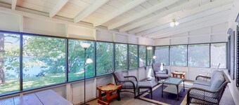 Dog-friendly cabin right on the lake with lots of space, screened porch, & boats