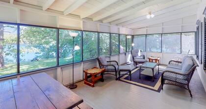 Dog-friendly cabin right on the lake with lots of space, screened porch, & boats