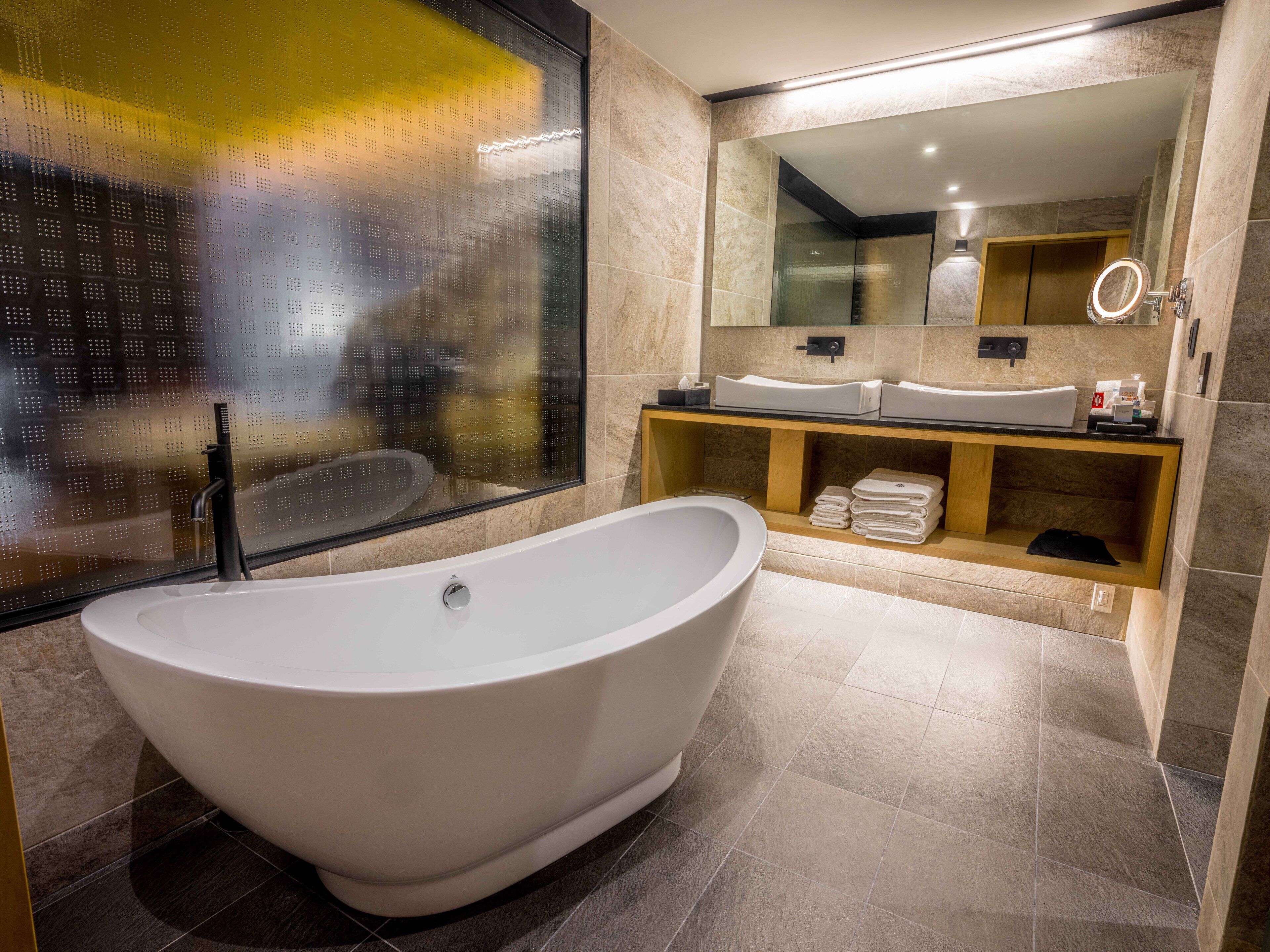 suite | bathroom | shower, rainfall showerhead, towels