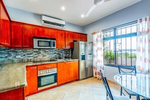 House, 1 Bedroom | Private kitchen | Fridge, microwave, stovetop, dishwasher - 2 Bedroom Ocean-View Condo with Pool (Cabo Velas)