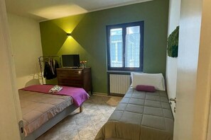 2 slaapkamers, een strijkplank/strijkijzer
