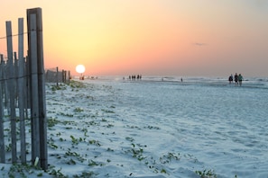 On the beach, sun loungers, beach towels