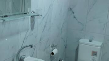 Shower, free toiletries, hair dryer, slippers