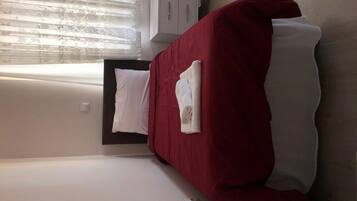 Shower, free toiletries, hair dryer, slippers
