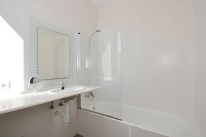 Bathtub, hair dryer, towels