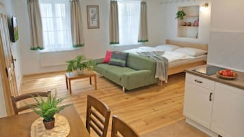 Apartamento de diseño | Zona de estar | Una televisión de pantalla plana