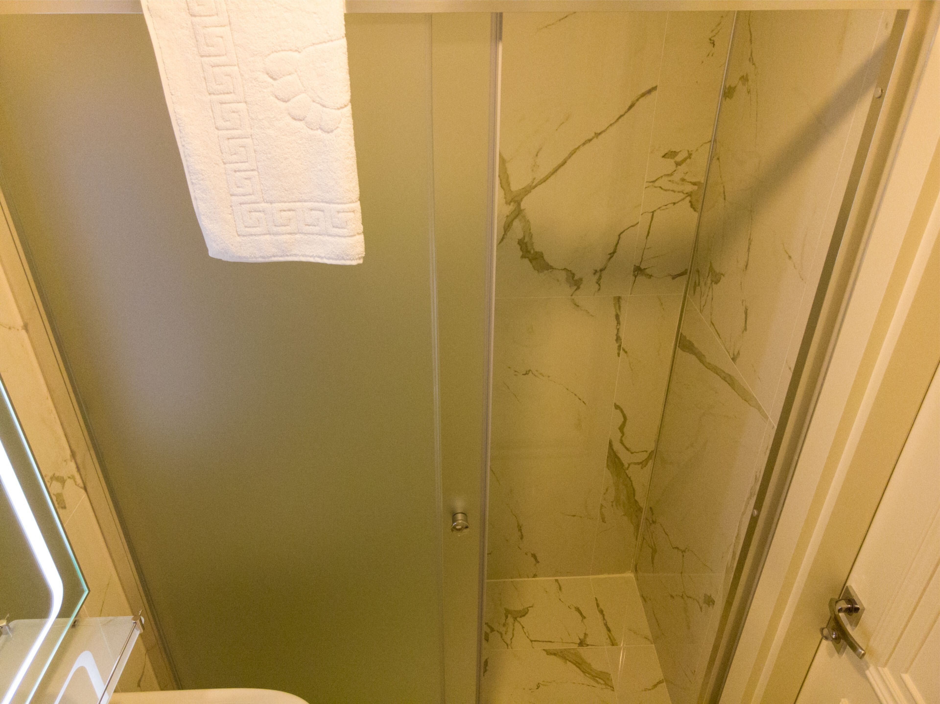 shower, rainfall showerhead, designer toiletries, hair dryer