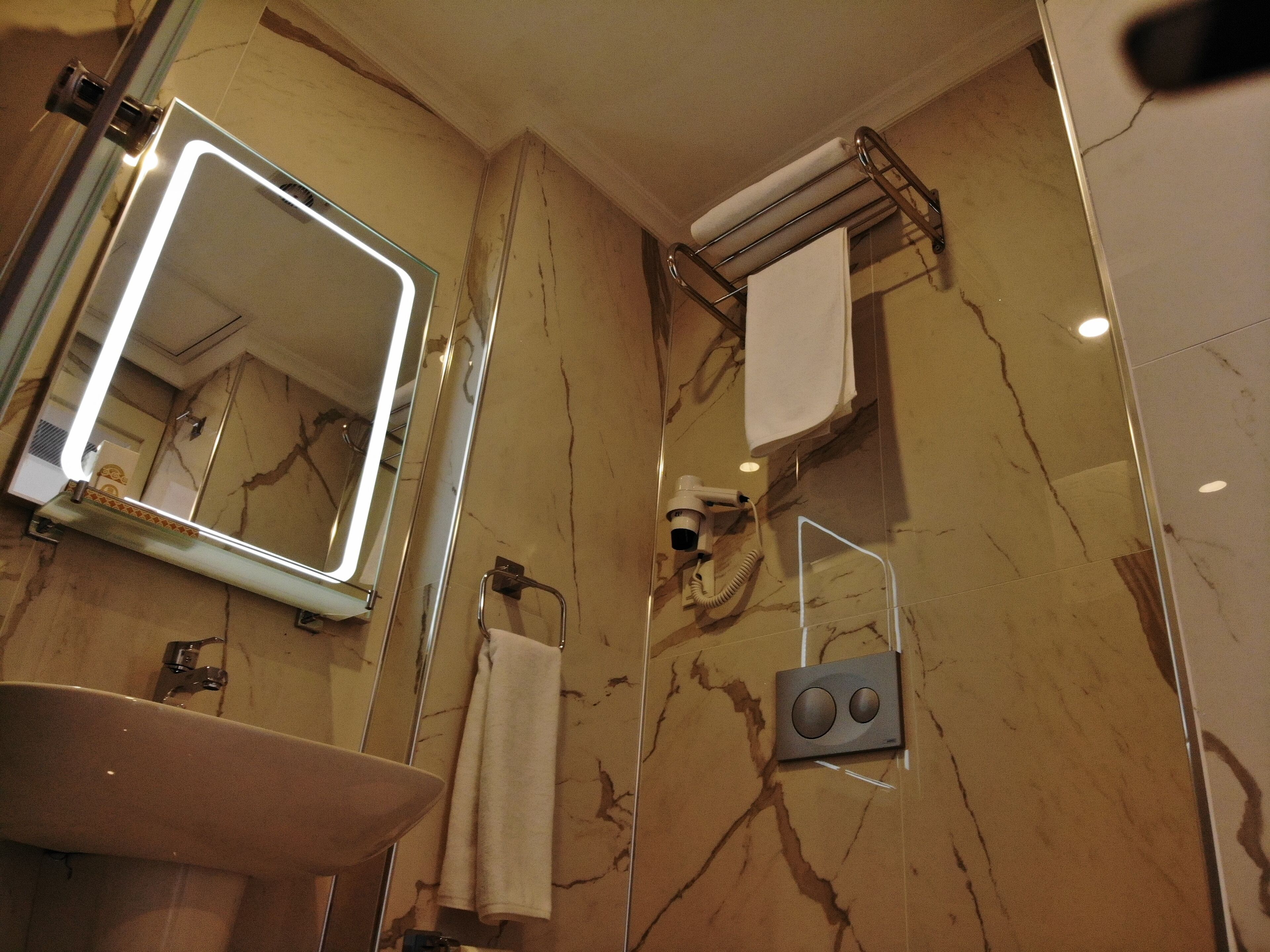 deluxe triple room | bathroom | shower, rainfall showerhead, designer toiletries, hair dryer