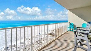 A balcony with a view of the beach and ocean. - Gulf-front corner unit. 5th floor. Beach service during season! (Fort Walton Beach)
