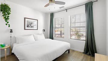 1 bedroom, desk, iron/ironing board, travel crib