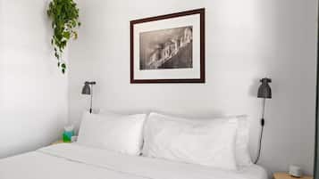 1 bedroom, desk, iron/ironing board, travel crib